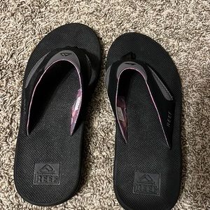 Reef Fanning flip flops with bottle opener